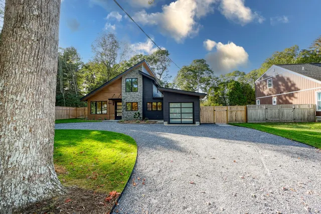 a house with a yard in front of it