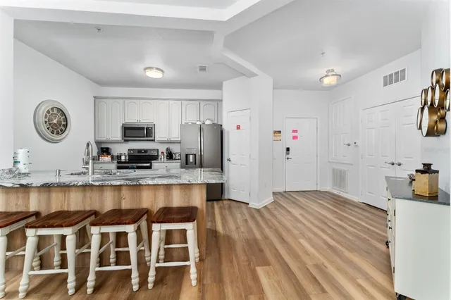 a table with a vase and a vase on it