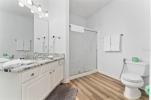 a bathroom with a tub and a shower