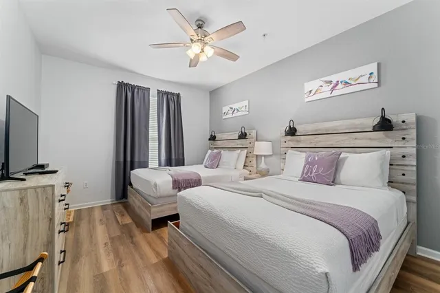 a balcony with table and chairs