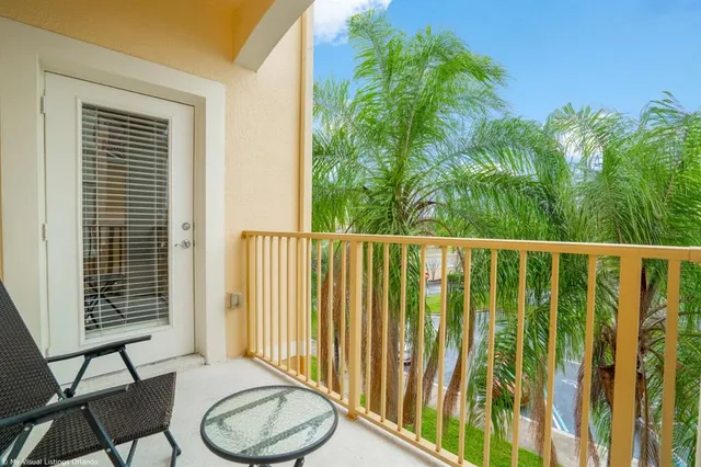 a front view of a house with many windows