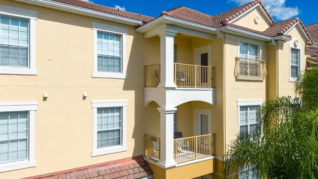 a view of a balcony with furniture