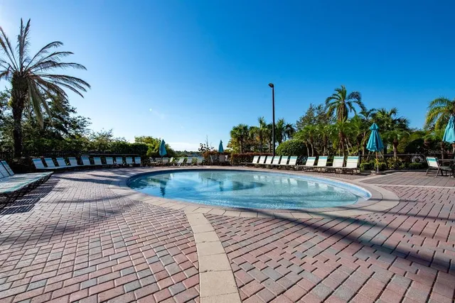 a view of a lake with a house in the background