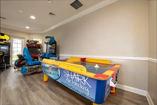 a room with furniture and a flat screen tv