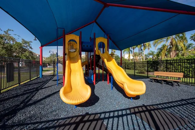 an aerial view of a city and swimming pool