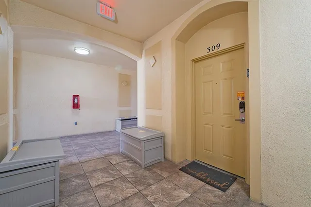 a view of cabinets with wooden floor