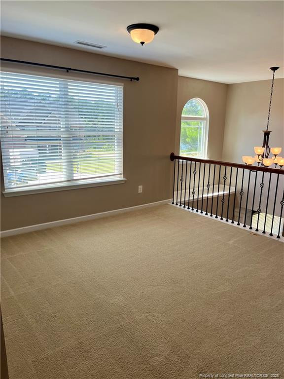 54 Inlet View Sanford, NC 27332 - Photo 12 of 25 a view of an empty room with a window