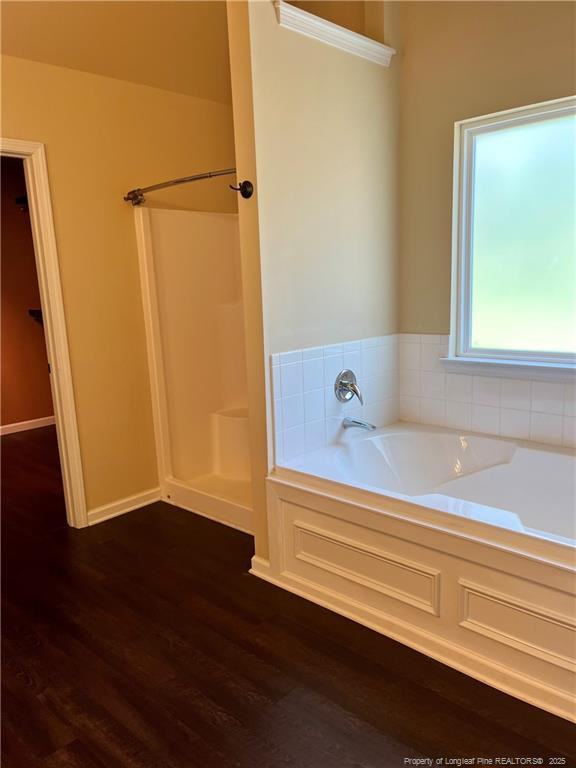 54 Inlet View Sanford, NC 27332 - Photo 19 of 25 a bathroom with a bathtub and a shower