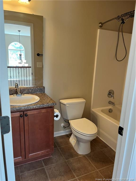 54 Inlet View Sanford, NC 27332 - Photo 21 of 25 a bathroom with a granite countertop toilet sink and shower