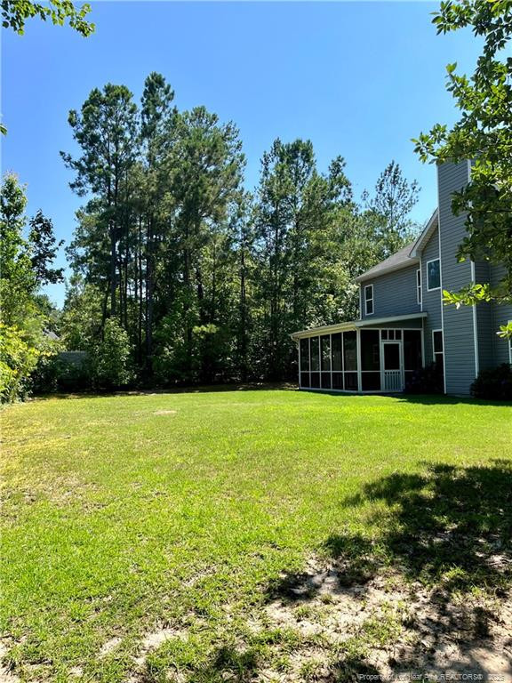 54 Inlet View Sanford, NC 27332 - Photo 24 of 25 a view of a backyard with a garden