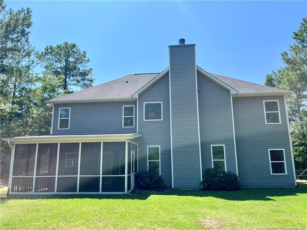 54 Inlet View Sanford, NC 27332 - Photo 25 of 25 a view of a house with a large window and a yard