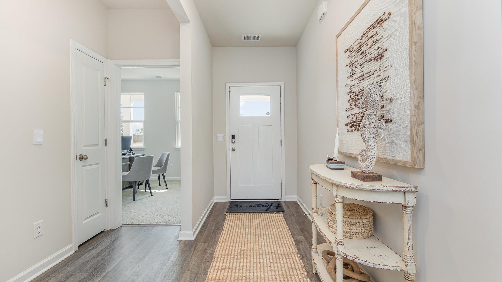 319 Ridley Street Longs, SC 29568 - Photo 2 of 30 Entrance foyer featuring dark wood-type flooring and baseboards