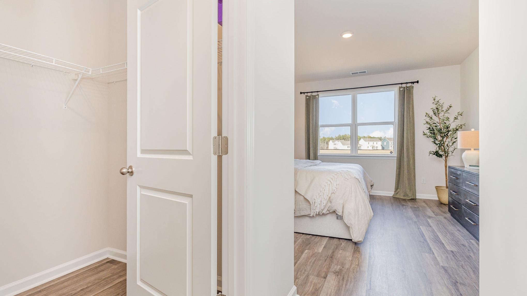 319 Ridley Street Longs, SC 29568 - Photo 21 of 30 Bedroom with light wood-type flooring and recessed lighting