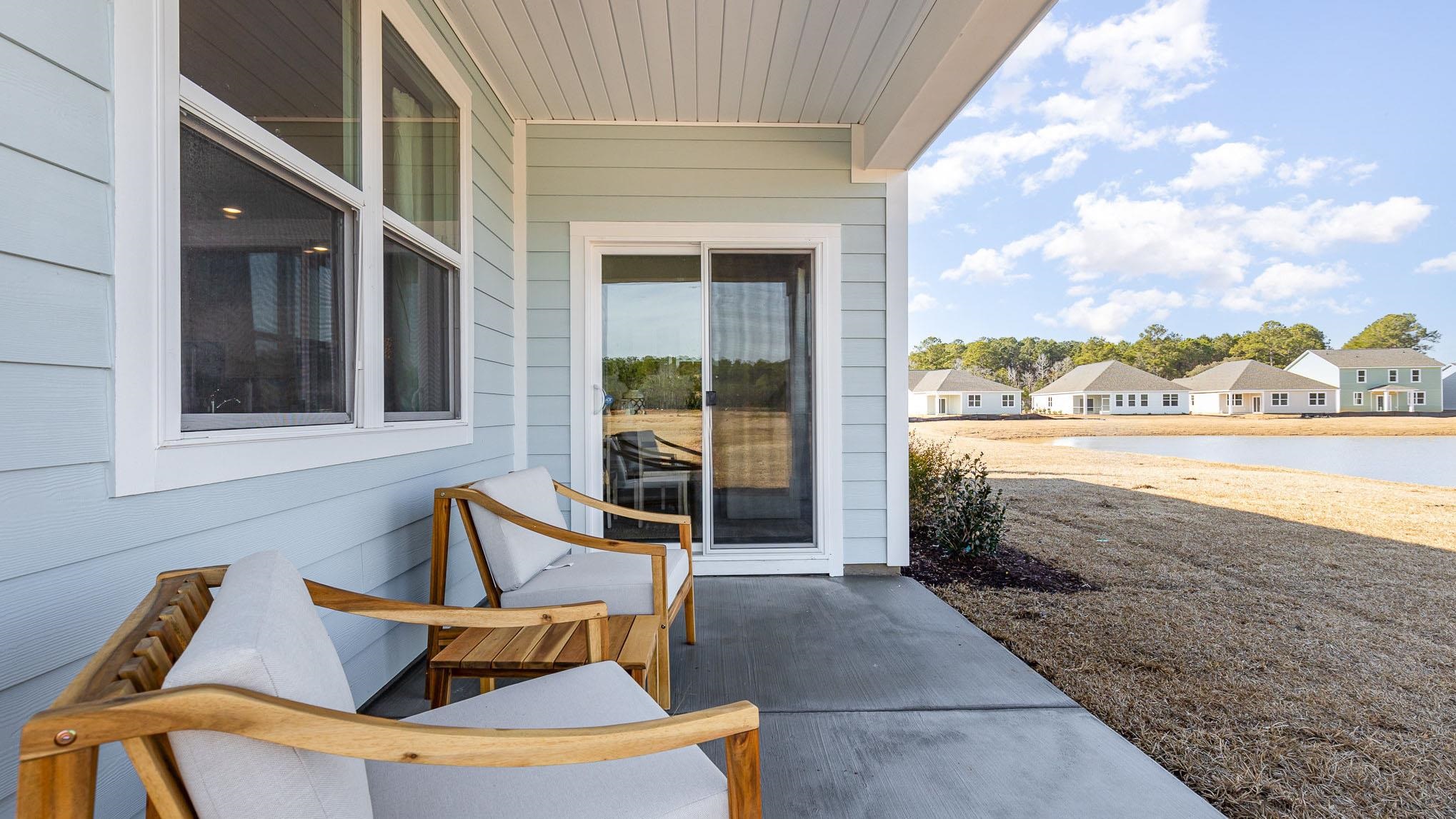 319 Ridley Street Longs, SC 29568 - Photo 26 of 30 View of patio with a water view and a residential view
