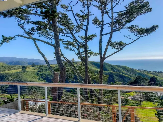 a view of a swimming pool with a porch