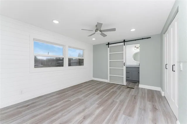 a kitchen with a stove top oven sink and cabinets