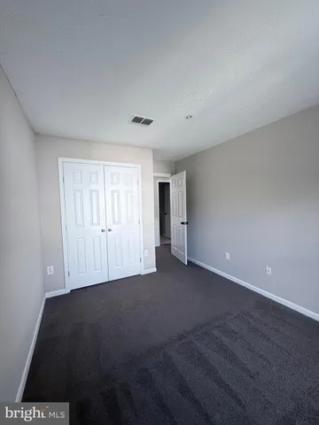 a view of hallway with washer and dryer