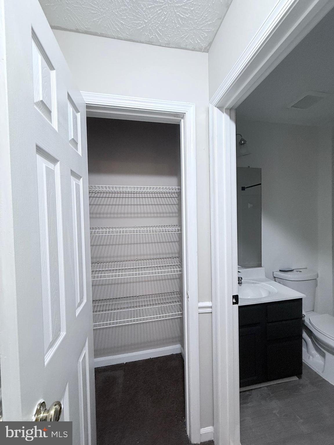 9216 Leigh Choice Court, Unit 10 Owings Mills, MD 21117 - Photo 21 of 32 a view of hallway with washer and dryer