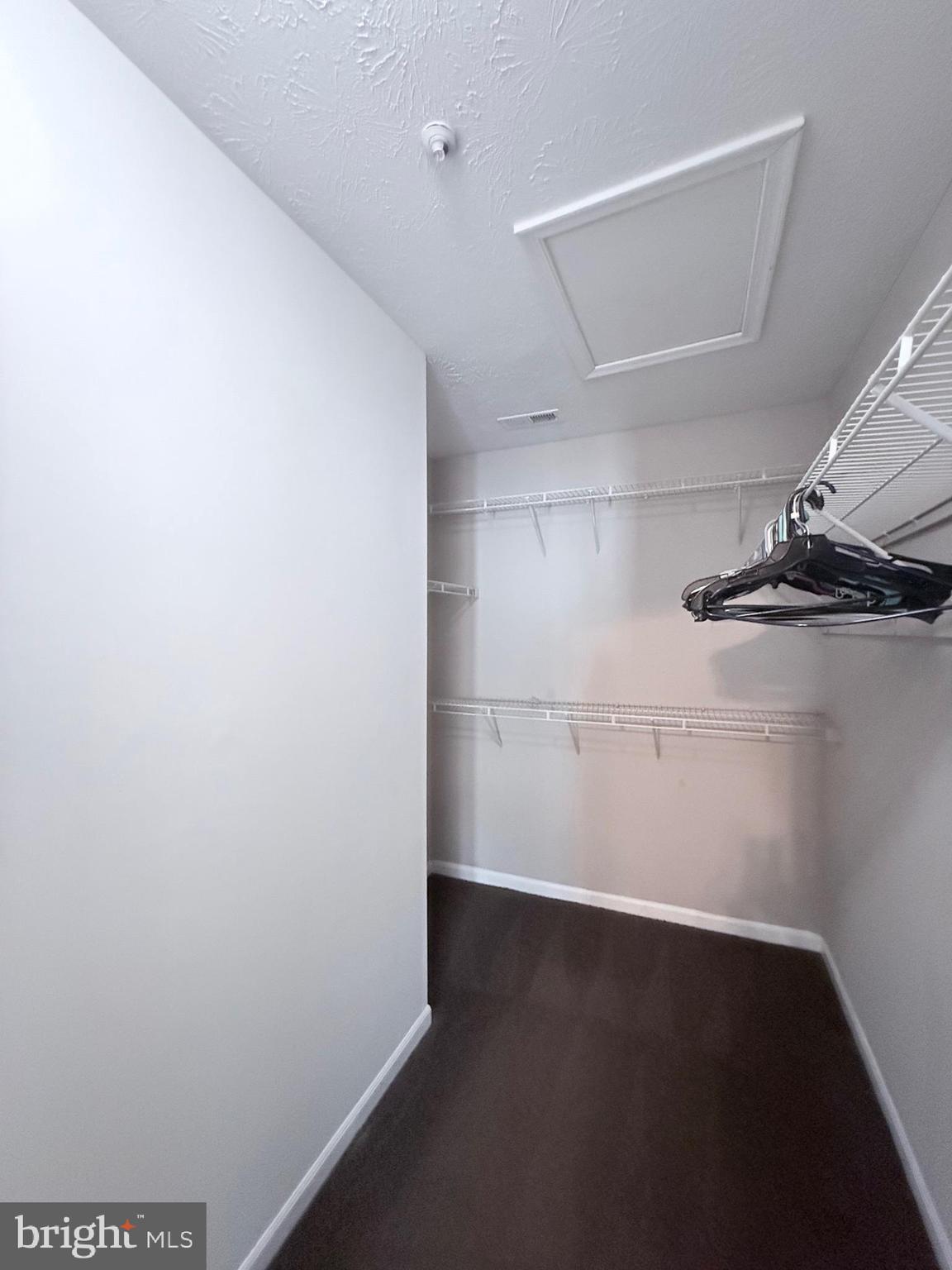 9216 Leigh Choice Court, Unit 10 Owings Mills, MD 21117 - Photo 31 of 32 an empty room with a workbench