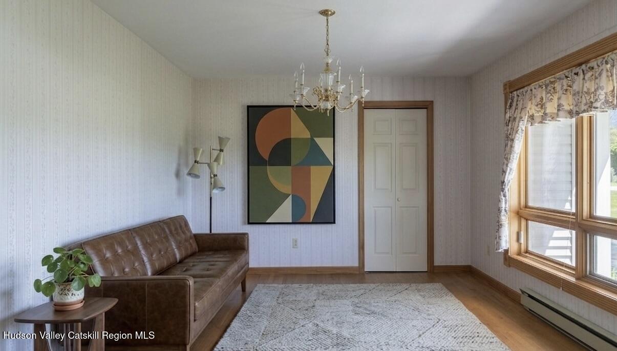 317 Mountain View Road Copake, NY 12516 - Photo 4 of 27 a living room with furniture and a window