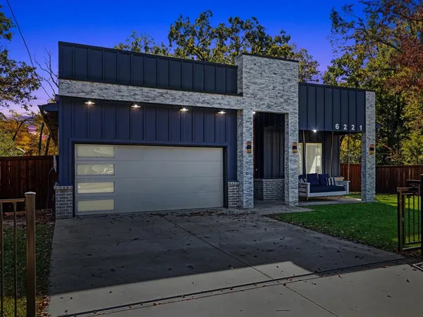 a view of a house with a garage