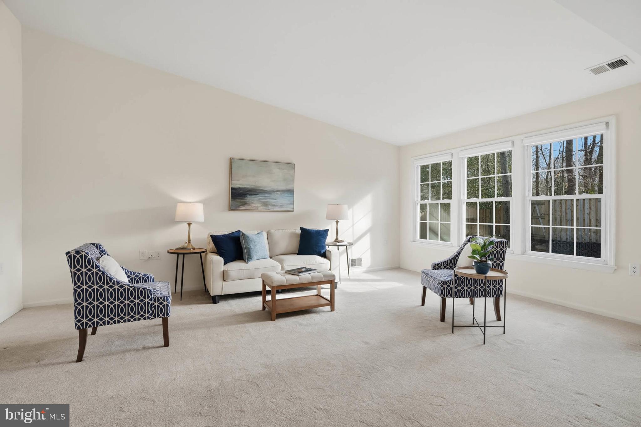 847 Woodmont Road Annapolis, MD 21401 - Photo 7 of 39 Bright Living Room with Cathedral Ceiling