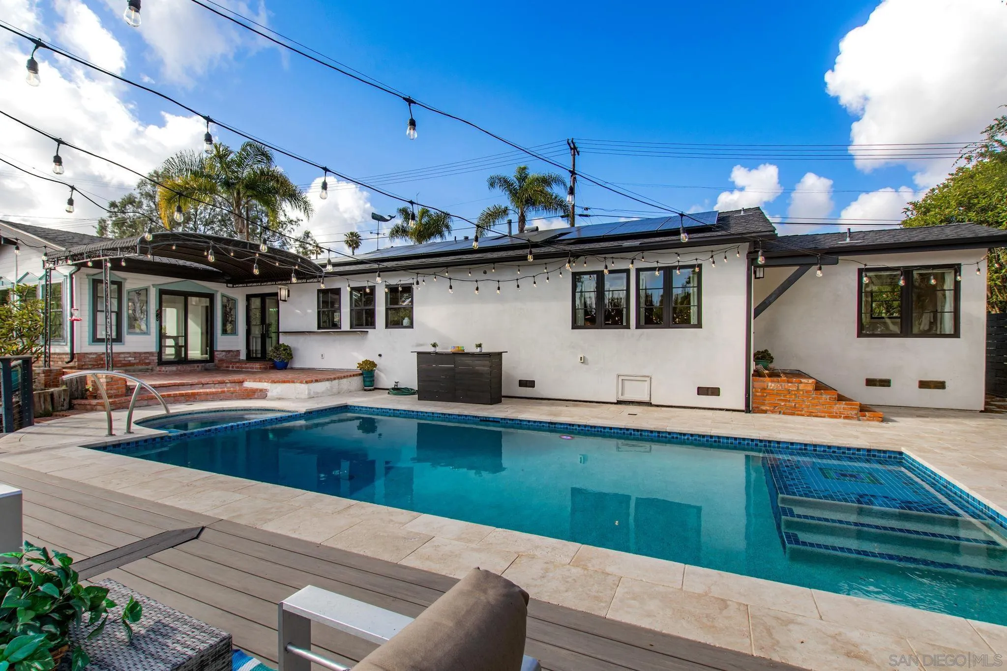 2335 Ivy Road Oceanside, CA 92054 - Photo 29 of 53 a swimming pool with outdoor seating