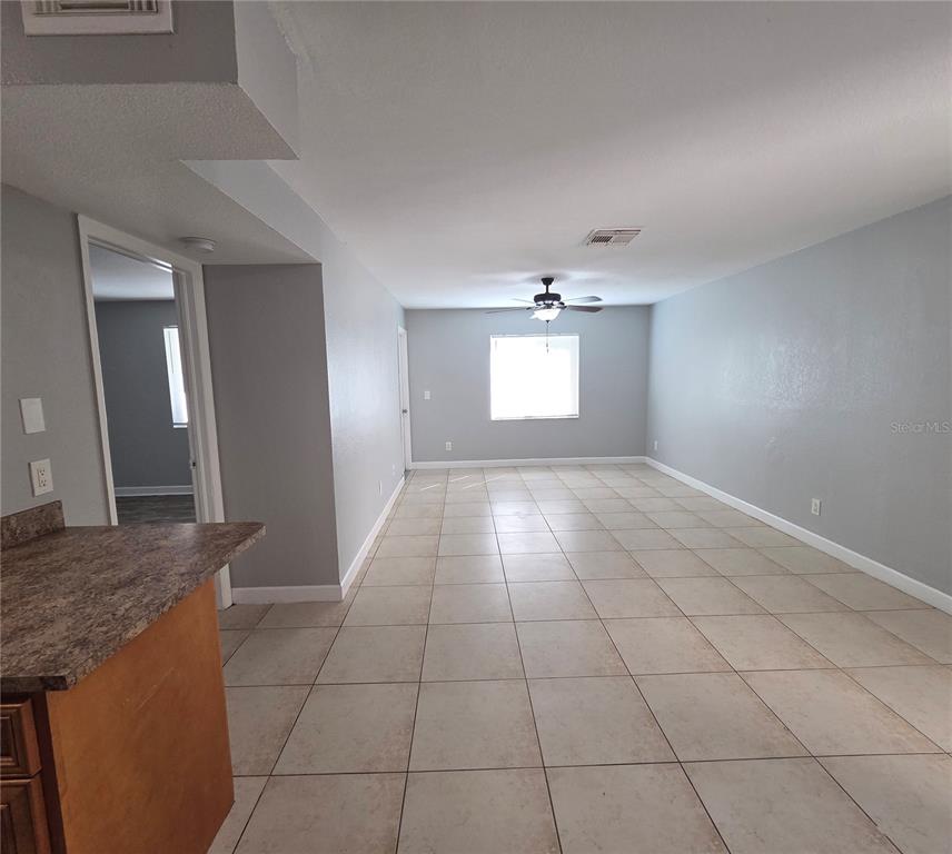 510 Golden Raintree Place, Unit 510 Brandon, FL 33510 - Photo 4 of 18 a view of an empty room and window