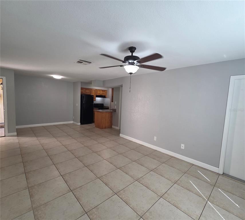 510 Golden Raintree Place, Unit 510 Brandon, FL 33510 - Photo 5 of 18 a view of an empty room with a window