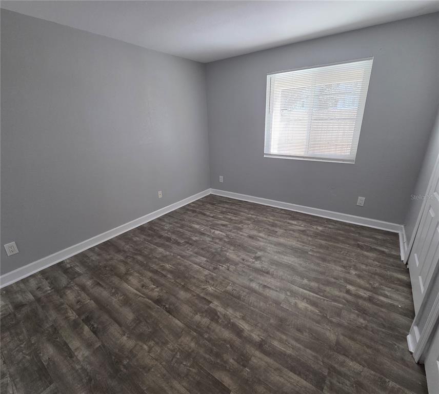 510 Golden Raintree Place, Unit 510 Brandon, FL 33510 - Photo 9 of 18 an empty room with a window