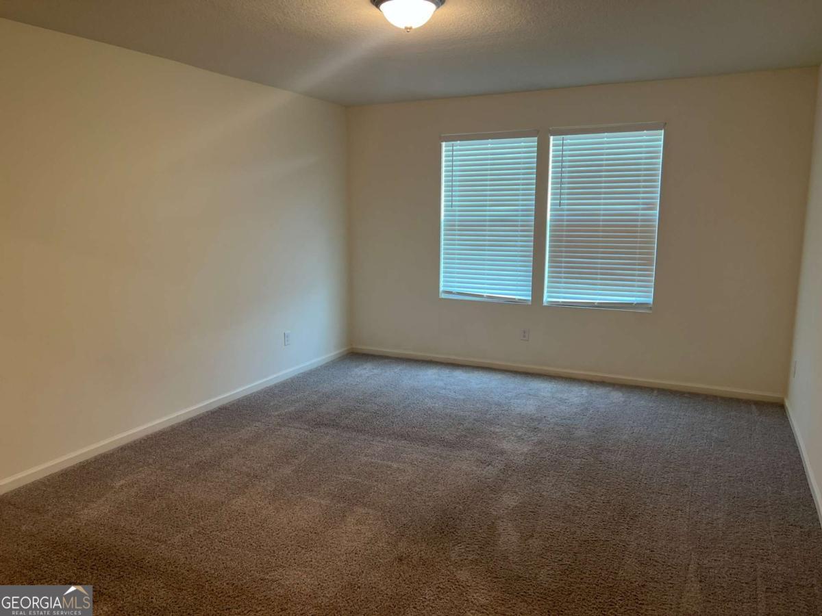 127 Oarsman Crossing St. Marys, GA 31558 - Photo 14 of 17 an empty room with a window