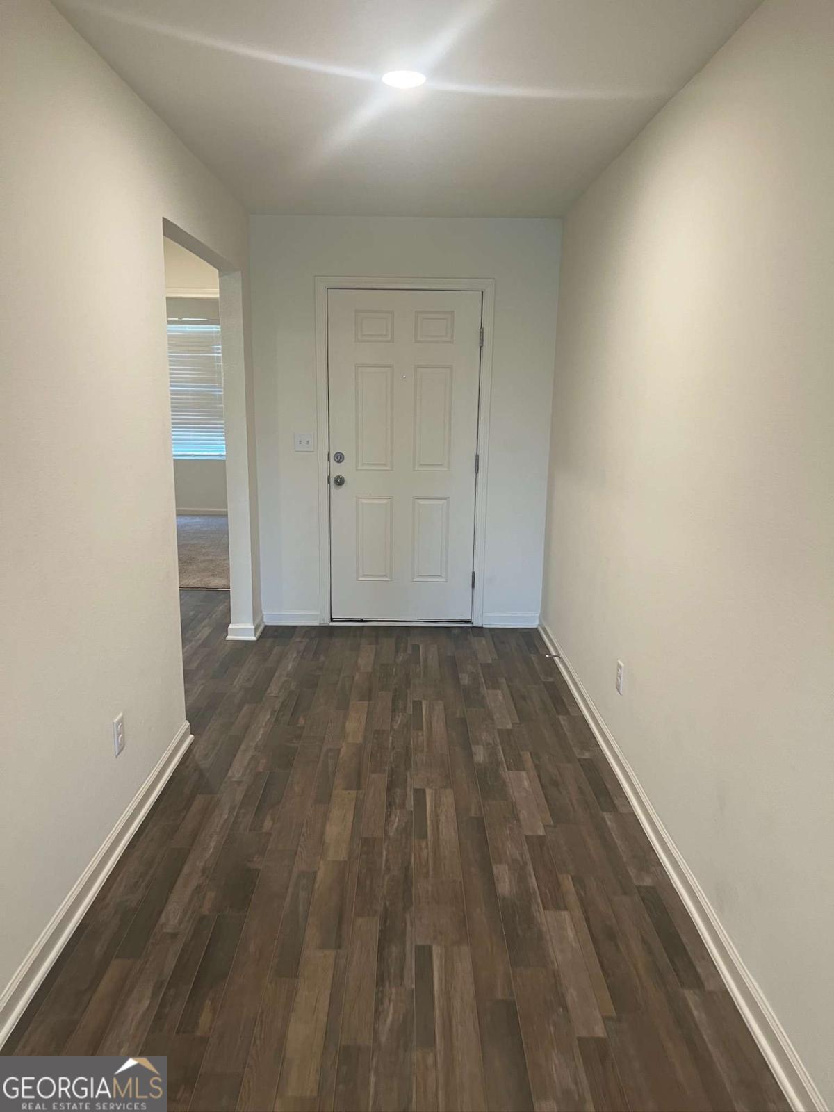 127 Oarsman Crossing St. Marys, GA 31558 - Photo 4 of 17 a view of a room with wooden floor
