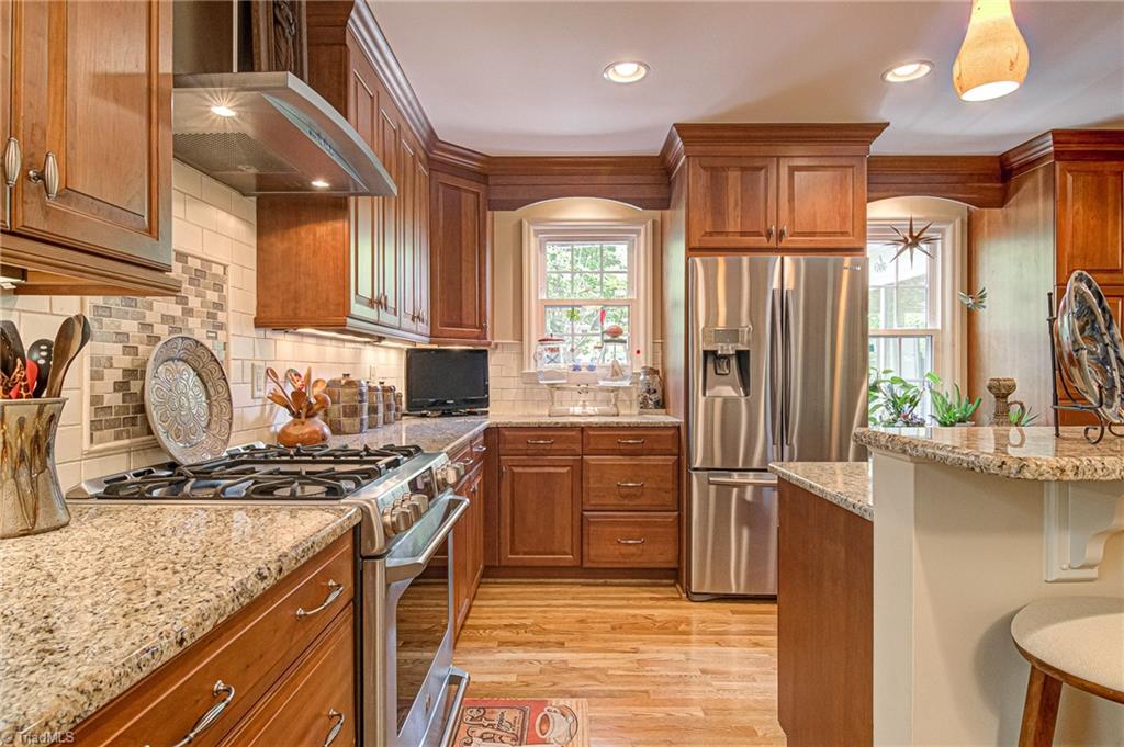 3038 Cambridge Road Winston-Salem, NC 27104 - Photo 13 of 31 Kitchen with breakfast area off to the right