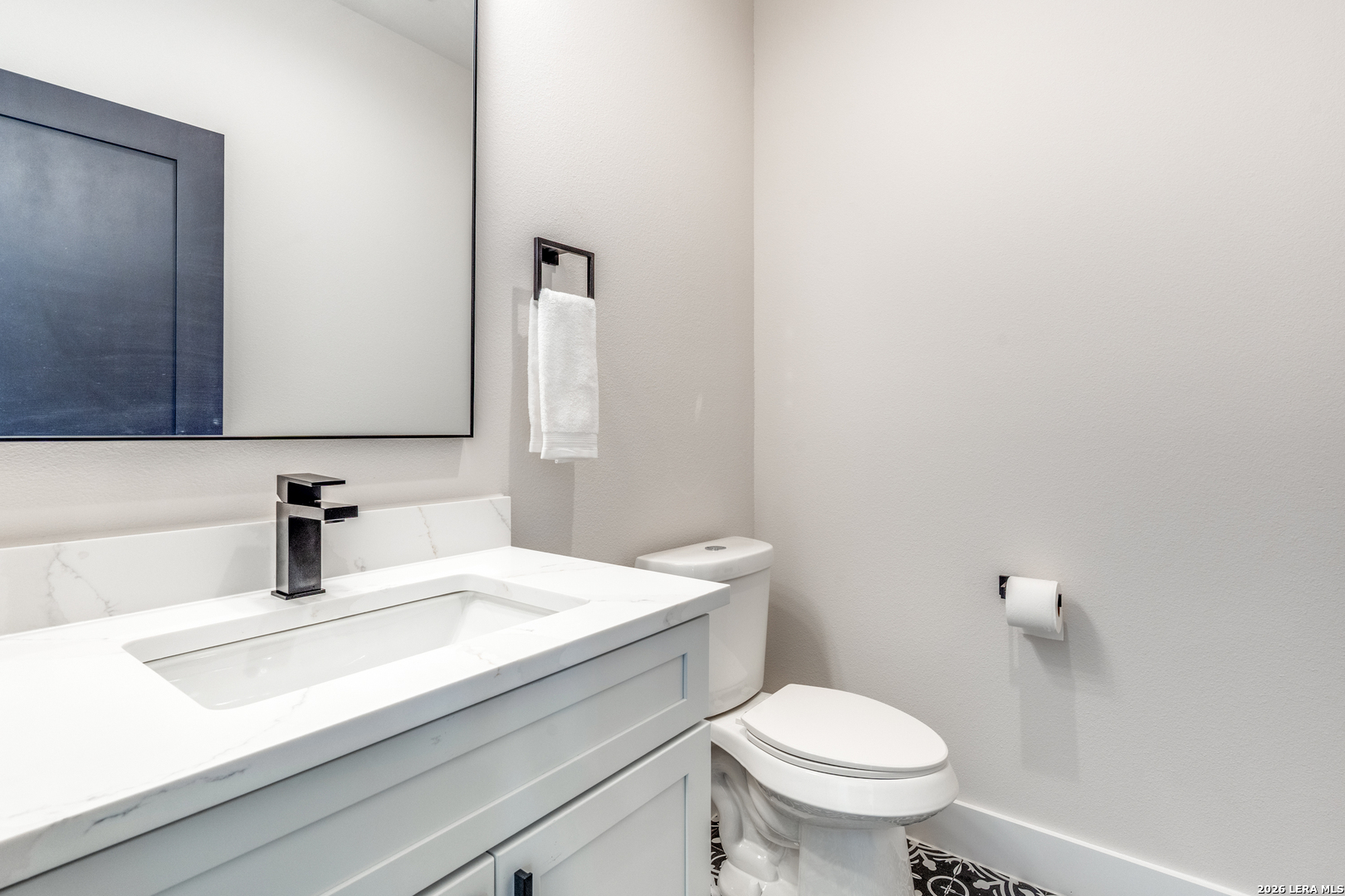 166 Restless Wind Spring Branch, TX 78070 - Photo 14 of 36 a bathroom with a sink toilet and a mirror