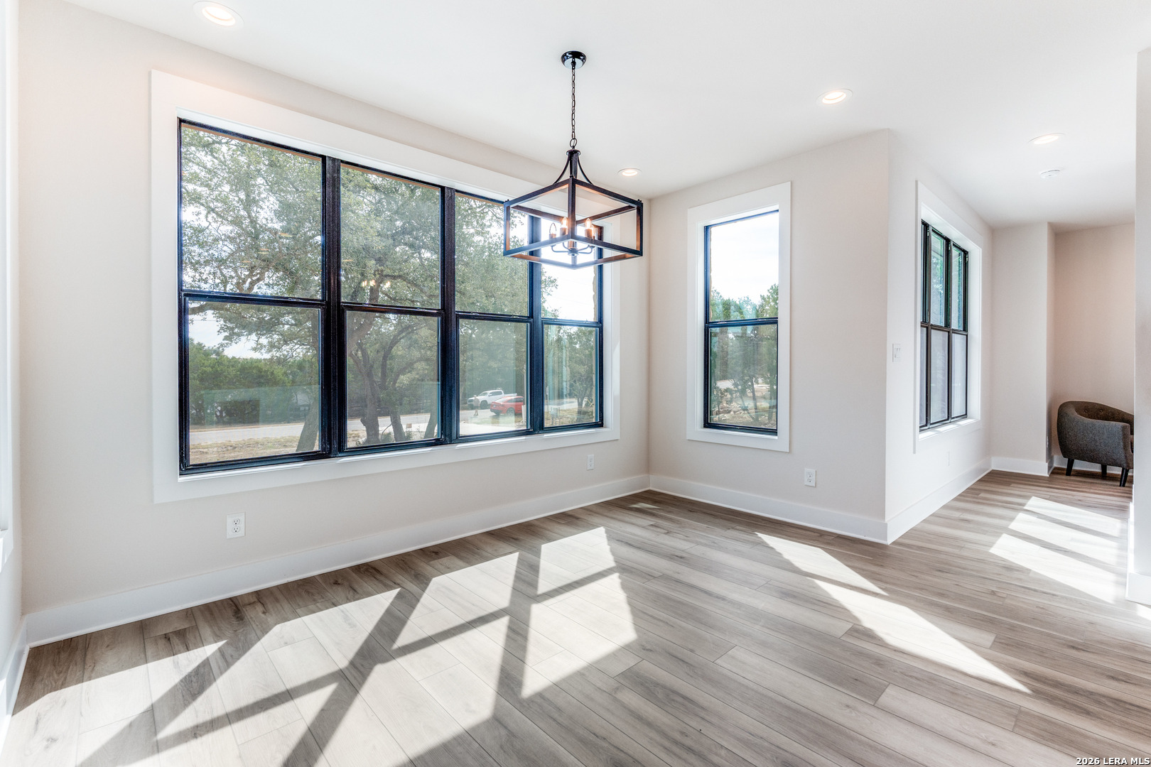 166 Restless Wind Spring Branch, TX 78070 - Photo 15 of 36 a view of a room window and wooden floor
