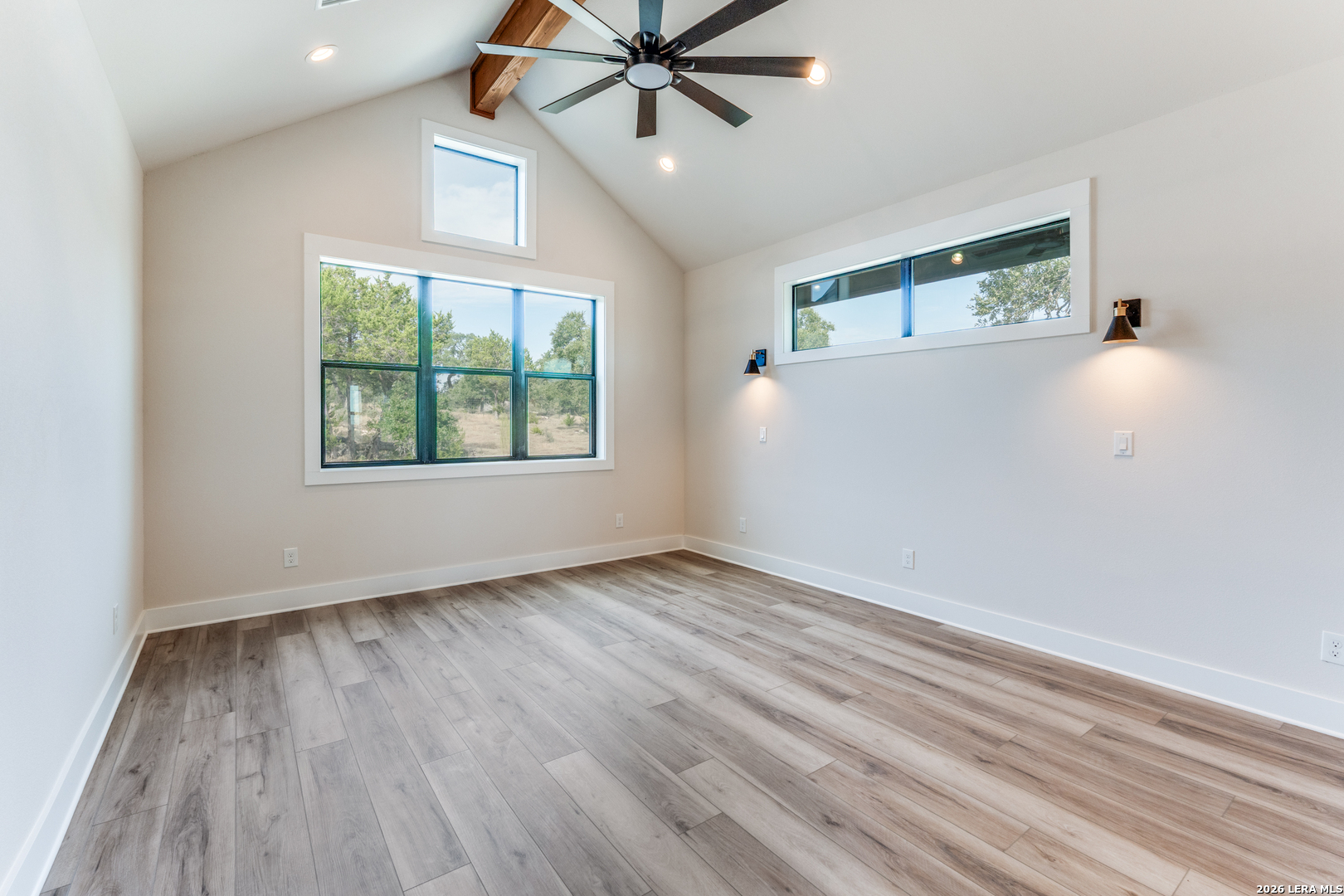 166 Restless Wind Spring Branch, TX 78070 - Photo 16 of 36 wooden floor in an empty room with a window