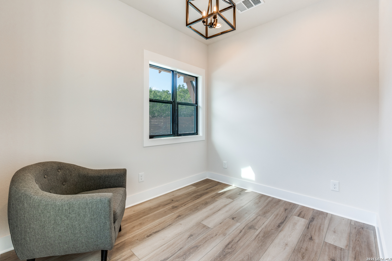 166 Restless Wind Spring Branch, TX 78070 - Photo 20 of 36 a view of entryway with wooden floor and front door