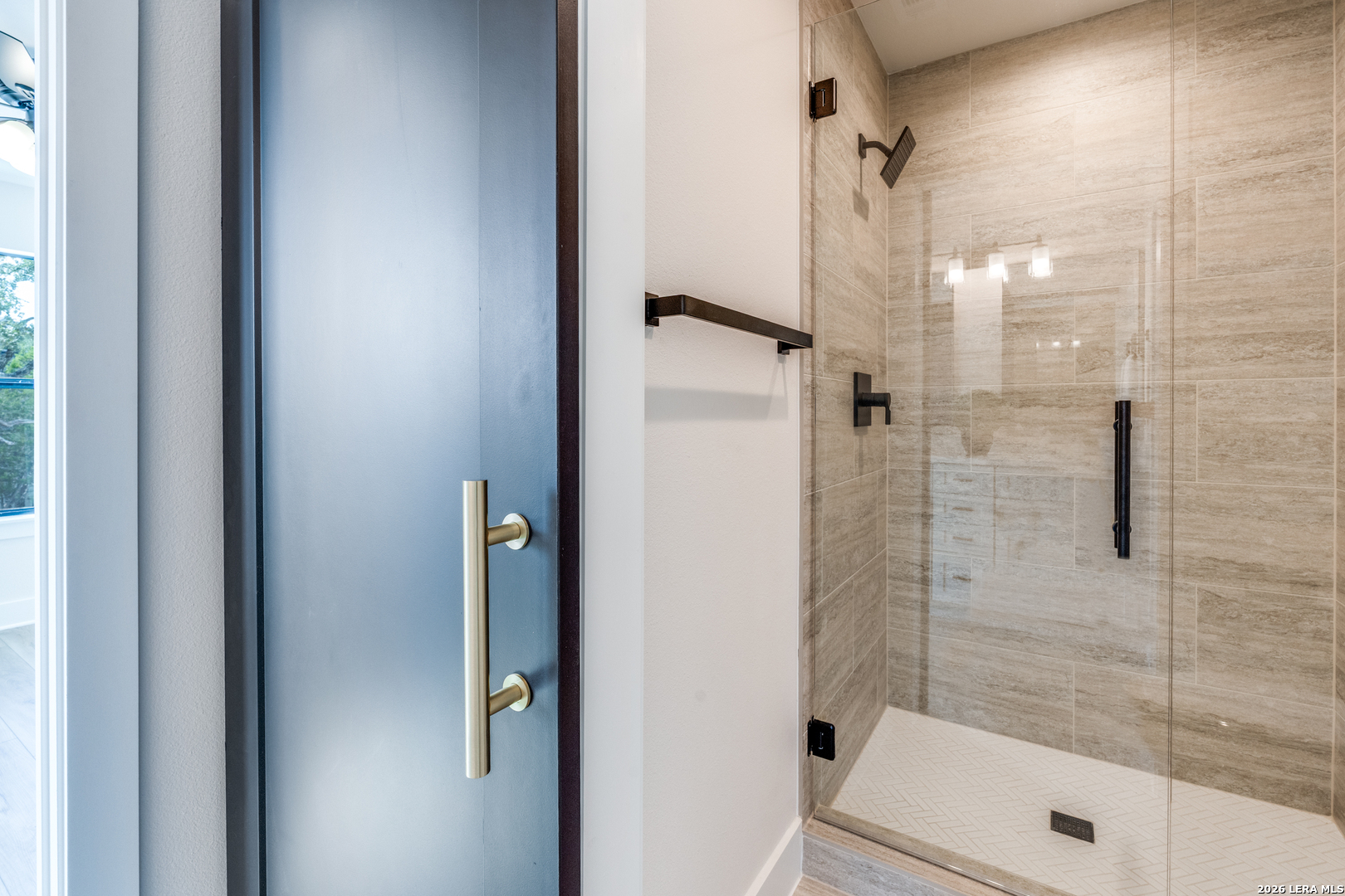 166 Restless Wind Spring Branch, TX 78070 - Photo 26 of 36 a bathroom with a shower