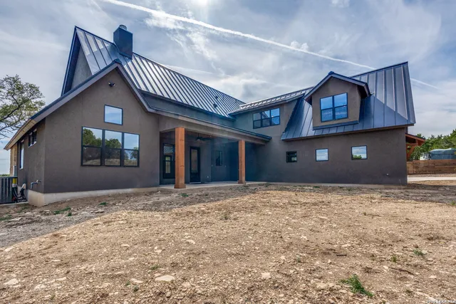 a view of a yard with trees