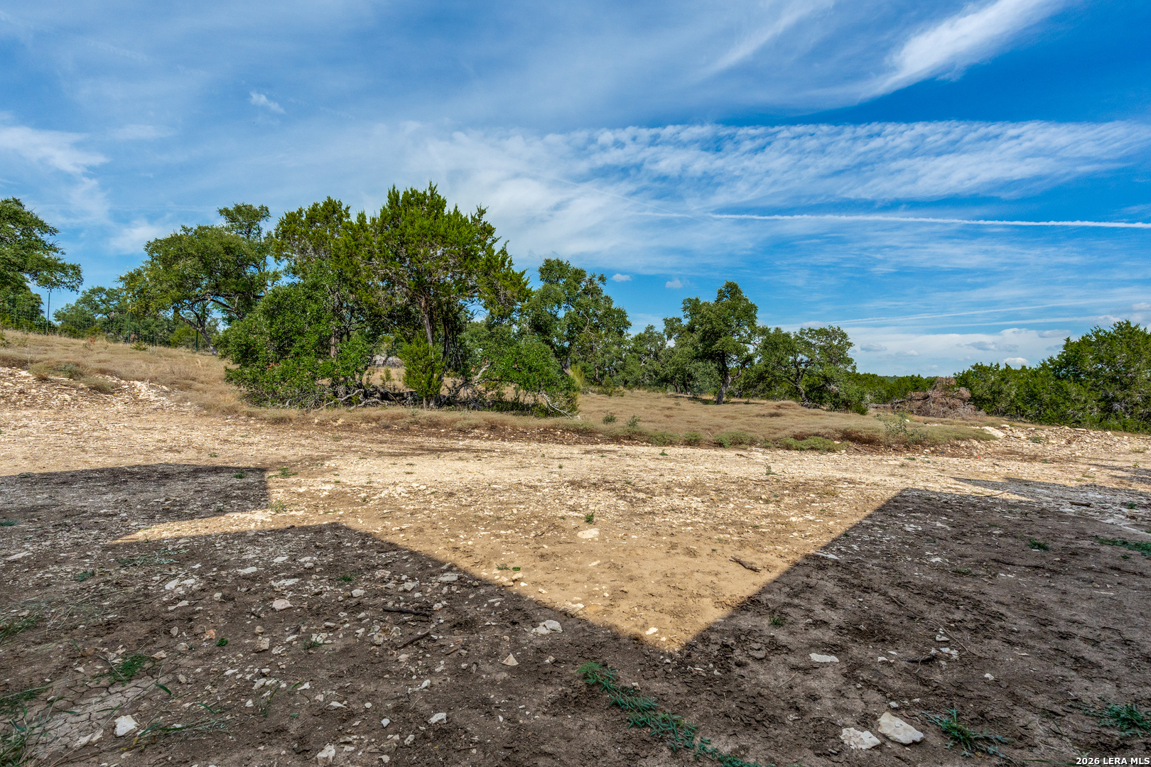 166 Restless Wind Spring Branch, TX 78070 - Photo 35 of 36 a view of a yard with trees