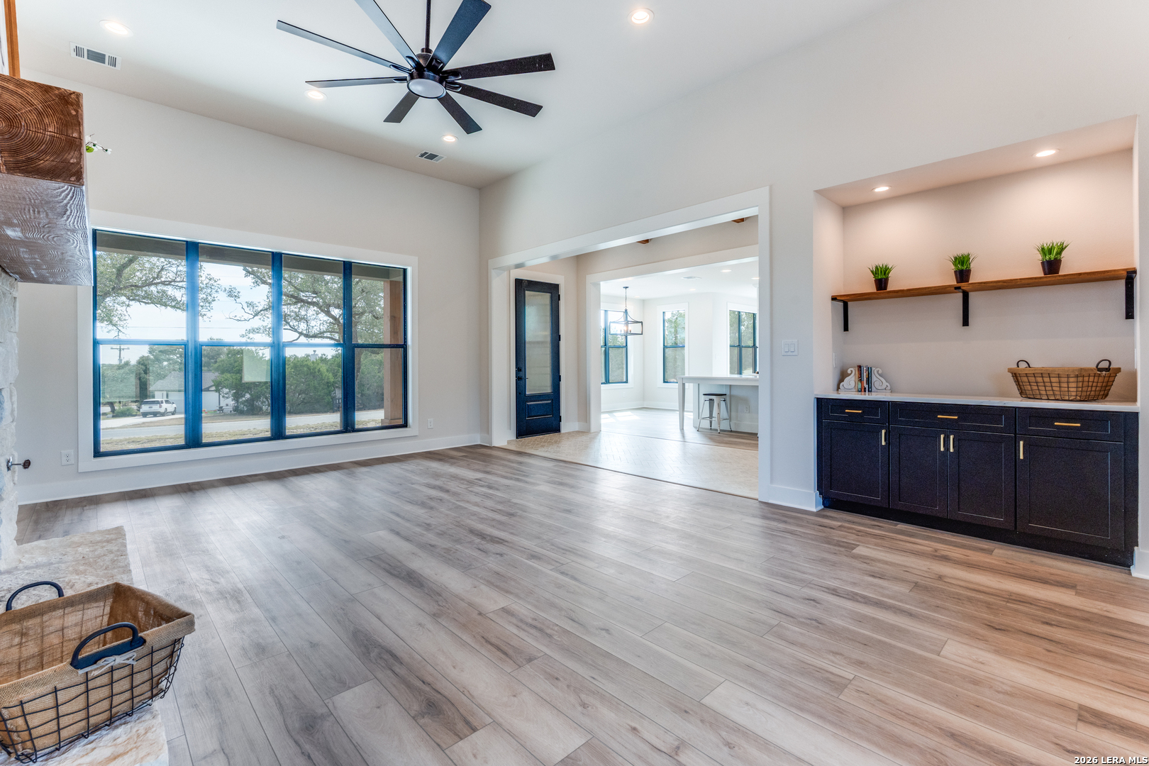 166 Restless Wind Spring Branch, TX 78070 - Photo 9 of 36 a view of a kitchen with a sink and a window