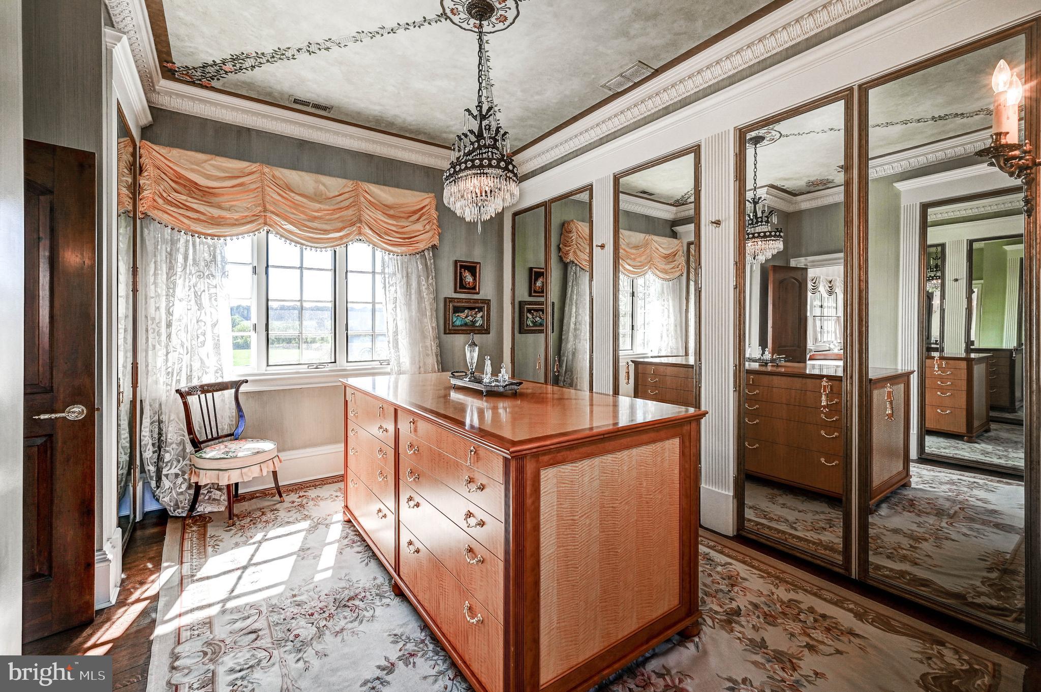 14921 Old York Road Phoenix, MD 21131 - Photo 65 of 97 a living room with furniture and a chandelier
