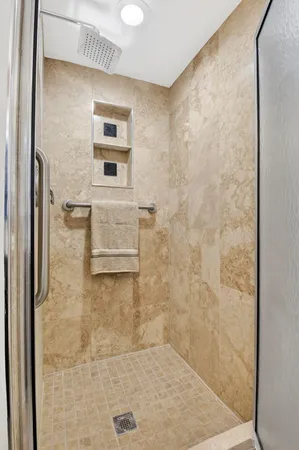 an aerial view of a house with a garden and swimming pool