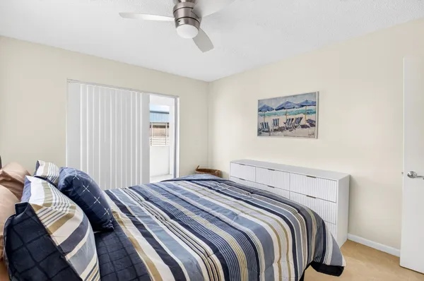 an aerial view of a house with a garden and swimming pool