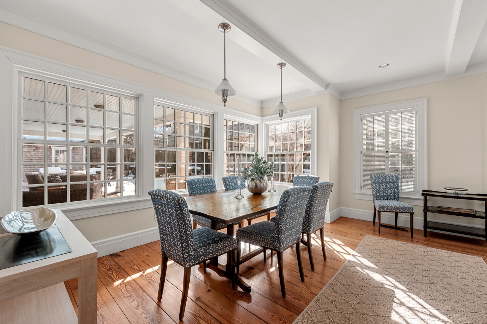 18 Mill Street Nantucket, MA 02554 - Photo 10 of 47 a view of a dining room with furniture window and wooden floor