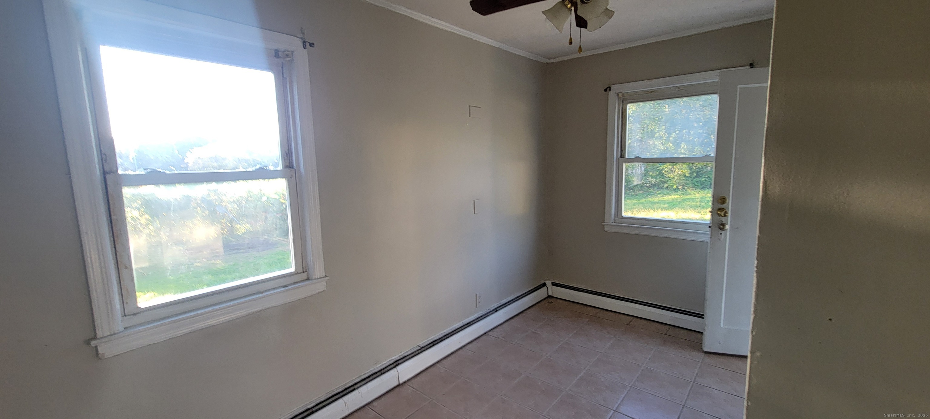 87 Ellington Street Hartford, CT 06106 - Photo 12 of 21 a view of an empty room with a window