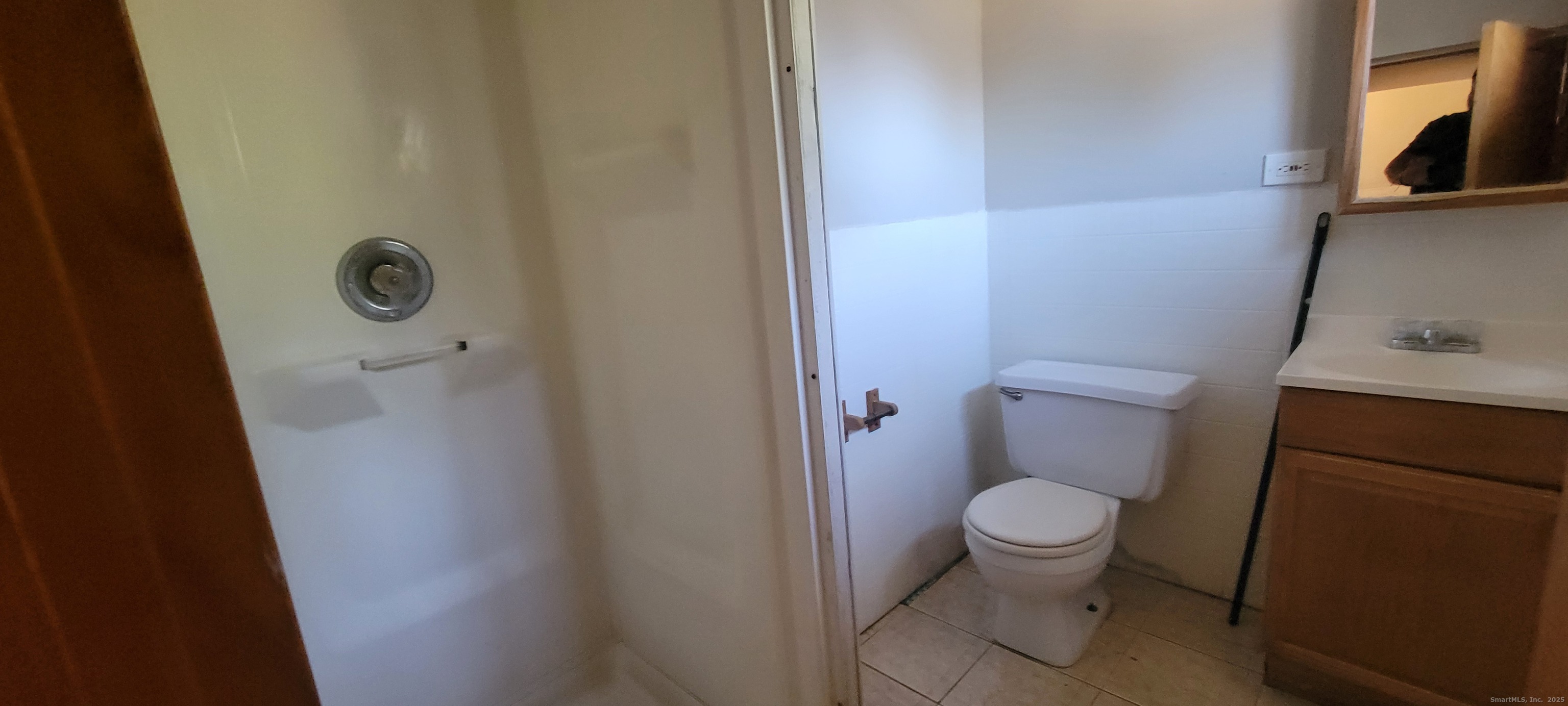 87 Ellington Street Hartford, CT 06106 - Photo 13 of 21 a white toilet sitting next to a sink