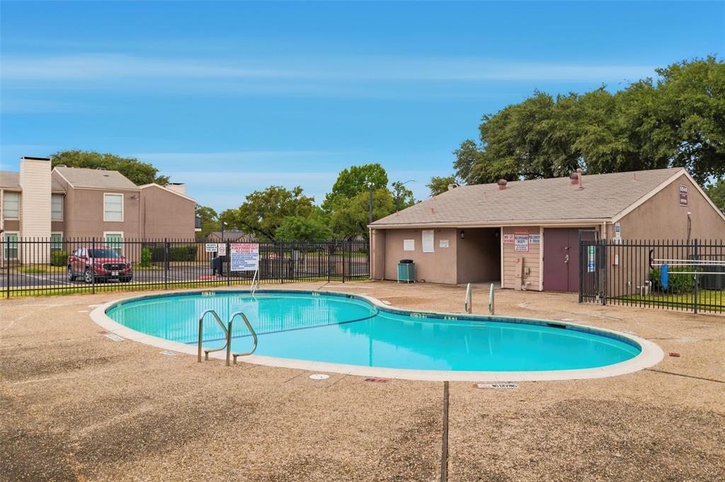 5604 Boca Raton Boulevard, Unit 248 Fort Worth, TX 76112 - Photo 24 of 25 a view of a house with swimming pool