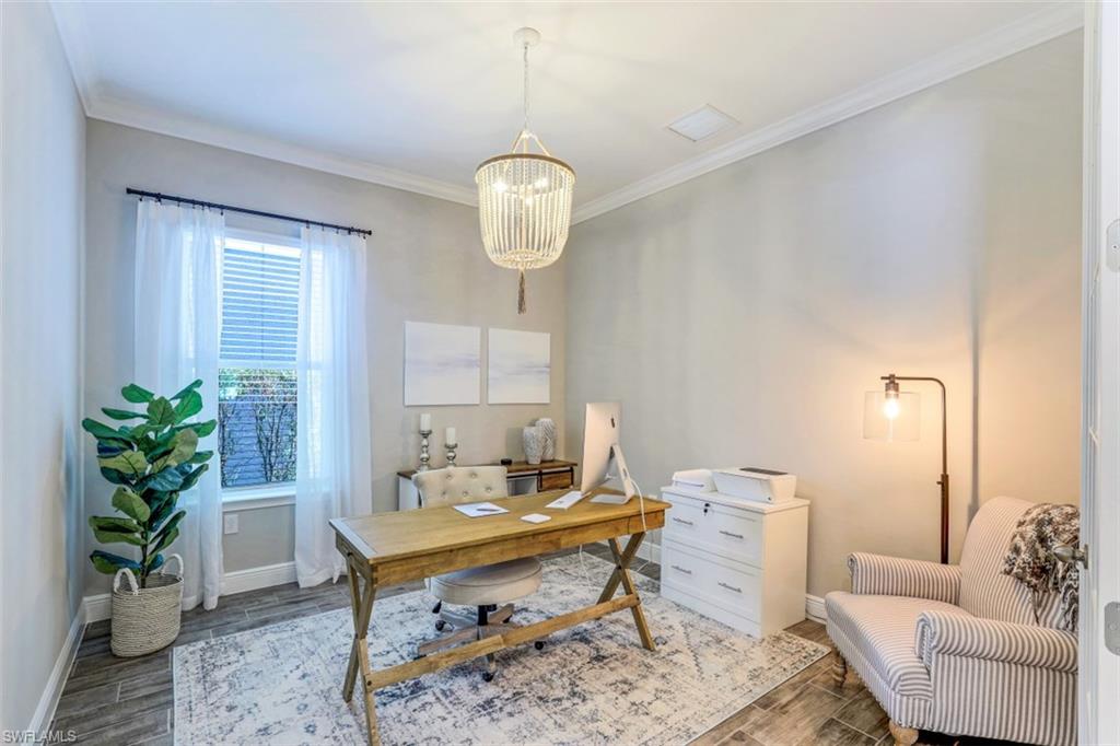 3528 Pilot Circle Naples, FL 34120 - Photo 23 of 46 a living room with furniture potted plant and a window