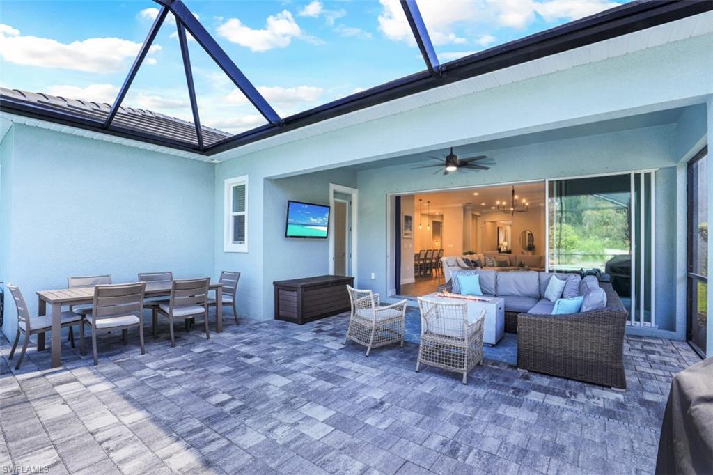 3528 Pilot Circle Naples, FL 34120 - Photo 34 of 46 a living room with furniture and a window